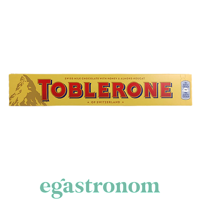 Шоколад молочний з медом та мигдальною нугою Тоблероне Toblerone 100g 20шт/ящ